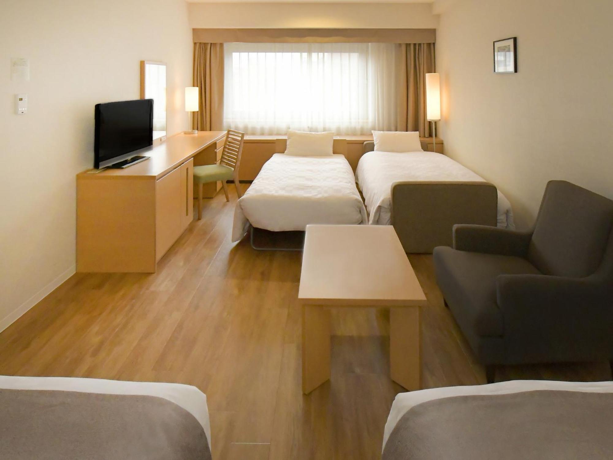 Sapporo View Hotel Odori Park Exterior photo A typical room at a business hotel in Japan